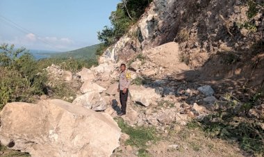 Bhabinkamtibmas-Polsek-Golewa-Tanggap-Cepat-Longsor-Bukit-Wolongizu-Pasca-Gempa,-Warga-Diimbau-Menjauhi-Lokasi